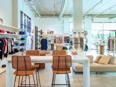 Modern clothing store with stylish and cozy decor.